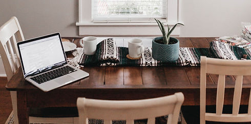 gray and black laptop computer on brown wooden table_edited.jpg