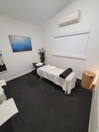 Thornlie massage treatment room with massage table inside of Thornlie Health.