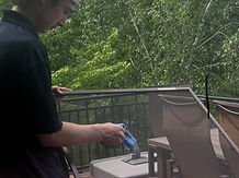 A window screen cleaning by a Range Window Cleaning employee