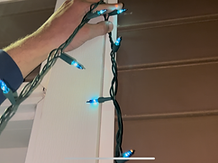 Holiday lights being used for a job