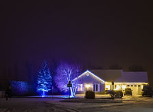 A home getting its holiday lights done