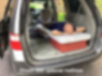 Thumbnail: minivan camper bed with storage