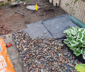 landscaping fabric and river rock