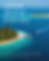 Alt Text: An aerial view of a secluded Caribbean island estate with crystal clear turquoise waters, illustrating the quieter side and exclusive nature of private luxury wedding venues in Mexico.