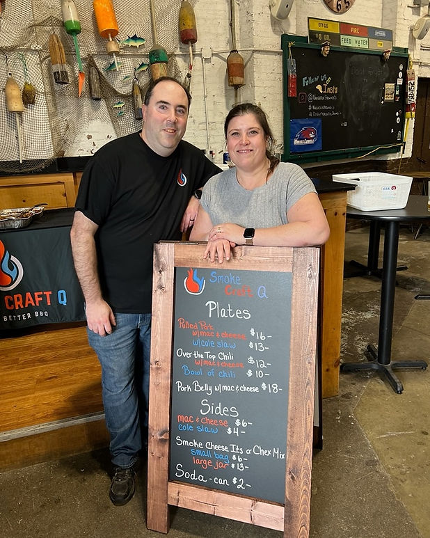 Dan and Michelle pose while at an event
