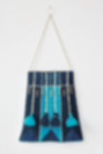 Décoration murale bleu et turquoise, pompons