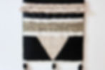 Tapisserie tissée noire et beige