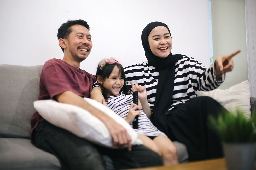 happy-family-watching-tv-together-sofa-living-room-home.jpg