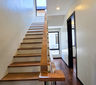 Modern 3-storey luxury house exterior in BF Homes Parañaque with sleek facade and 3-car garage