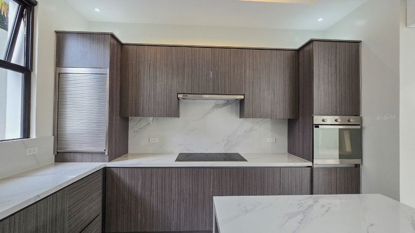 Main kitchen with premium cabinets and built-in appliances