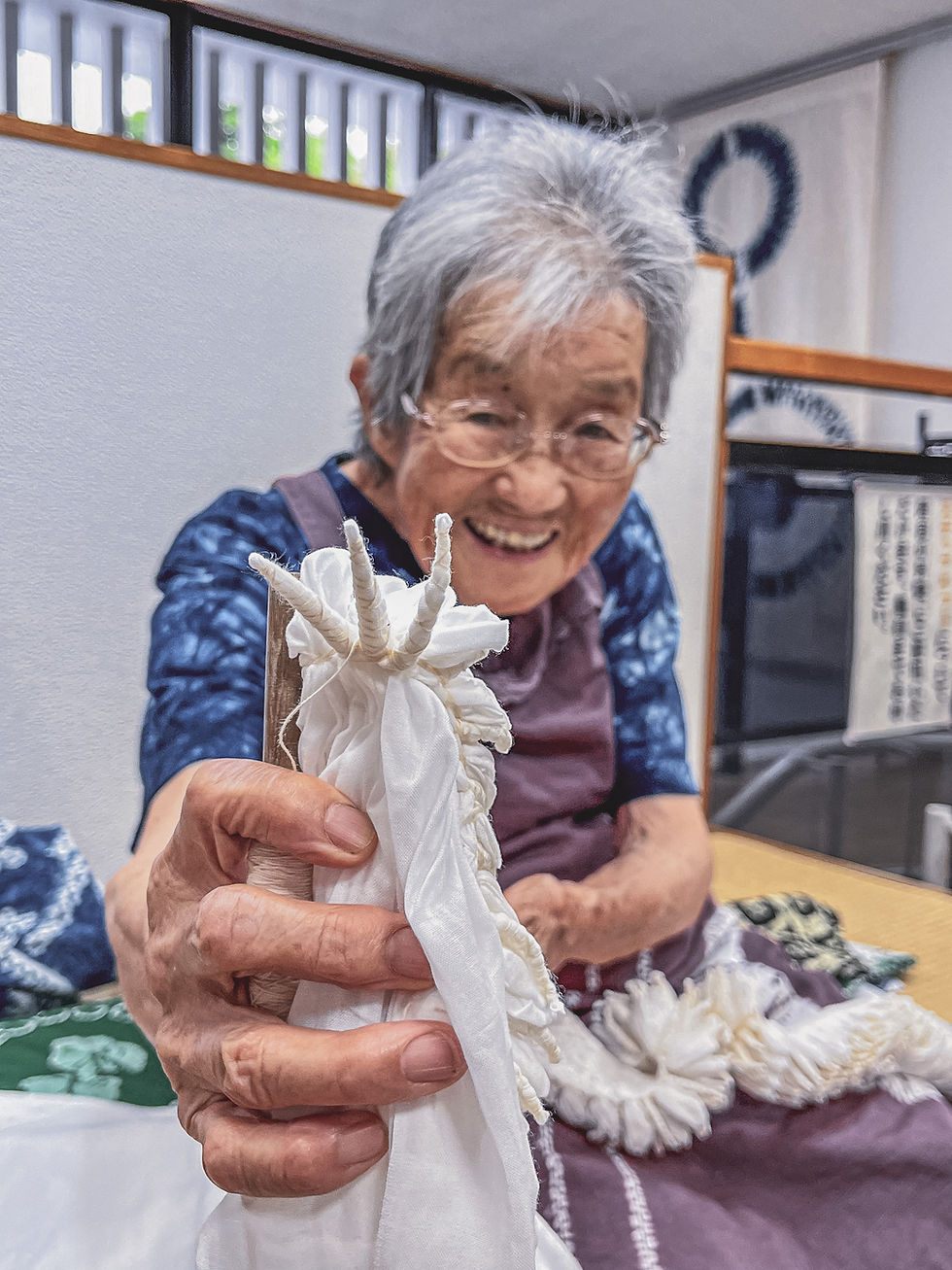 Ms. Takahashi showing us her lovely work
