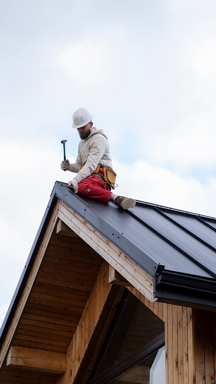 full-shot-man-working-roof.jpg