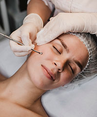 woman-getting-skincare-procedure-wellness-center.jpg