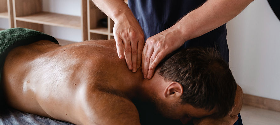 high-angle-man-getting-massage_edited_edited.jpg