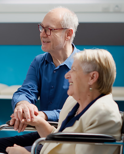 senior-couple-holding-hands-in-hospital-exam-room-2026-01-08-02-10-05-utc.jpg