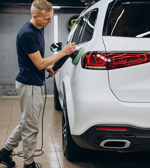 man-polishing-car-with-orbital-applicator.jpg