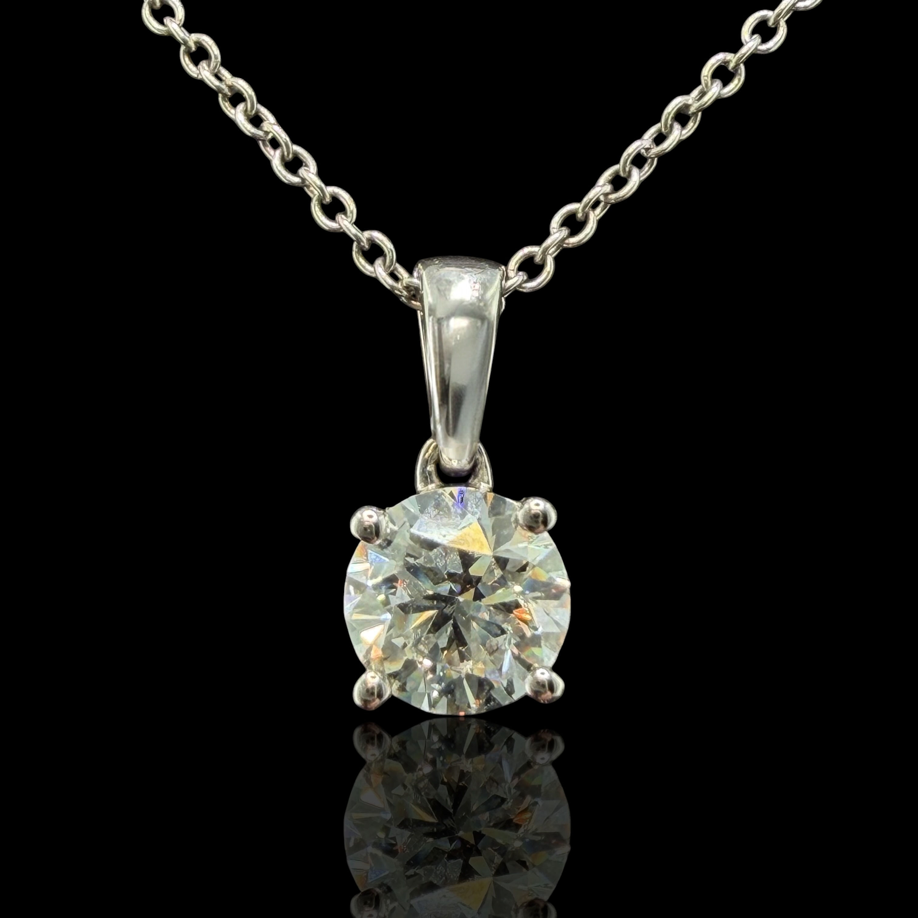 Authentic estate Revelation 14K white gold diamond dangling solitaire pendant
