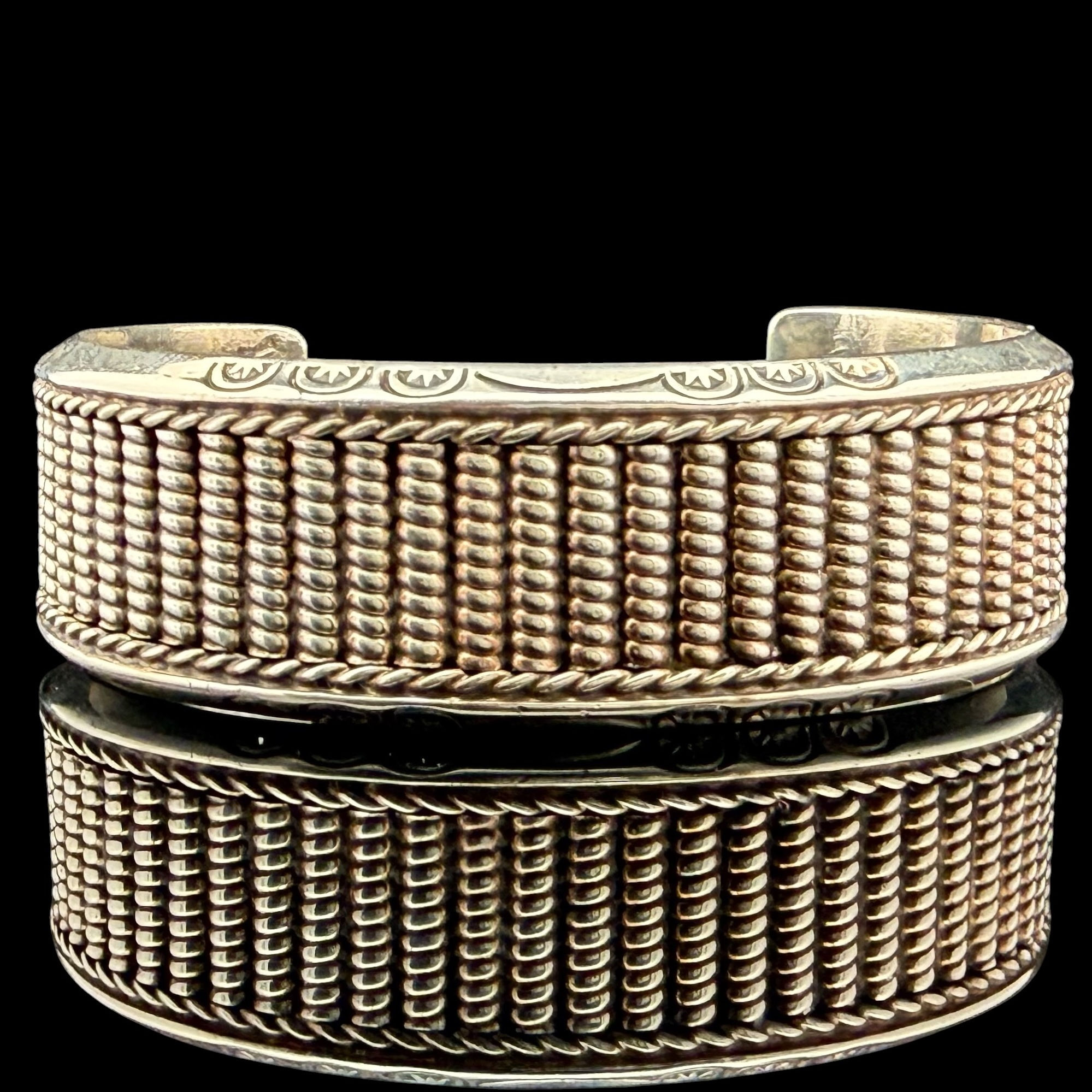 Native sterling silver twisted wire/rope lined motif cuff bracelet
