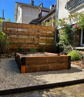 Création d'un espace potager en bois sur mesure