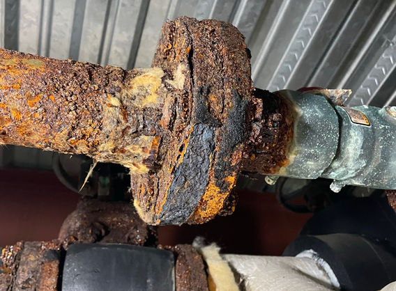 Photo of the shut off value for the pipe that feeds the original building.
