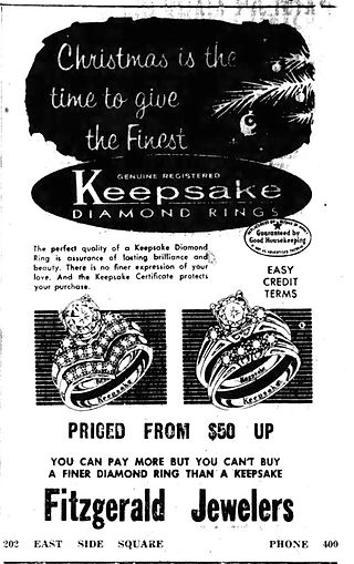 Newspaper clipping of an advertisement for Fitzgerald Jewelers with two drawing of diamond rings with the headline reading "Christmas is the time to give the finest.  Genuine registered Keepsake diamond rings."