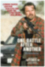 Man with rifle in checkered shirt stands outdoors. Text: One Battle After Another. Credits and release date: September 26. Tense mood.