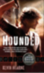 Book cover for Hounded by Kevin Hearne picturing a man pulling a sword from behind his back over his shoulder.