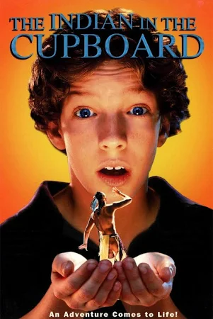 DVD cover with a young boy holding a tiny indian in his hands