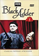 DVD cover with two men standing in front of a red curtian