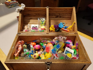 Photo of the treasure box prizes on the children's floor