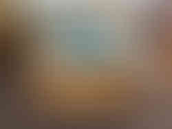 Children's floor return cart with books and a bag