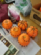Photo of pomander oranges with clove designs