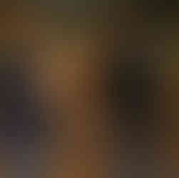 Photo of one of the high school volunteers moving boxes