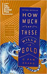 Gold book cover with and title banner with blue tigers wrapped around it