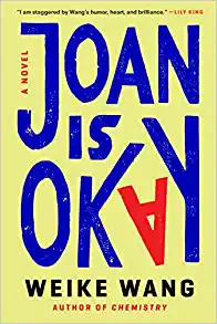 Yellow book cover with Joan is Okay but with the "A" in okay red and upside down