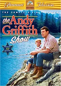 DVD cover with a man and his son sitting on the river bank with fishing poles