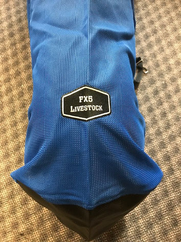 Blue FX5 Livestock bag on a patterned floor