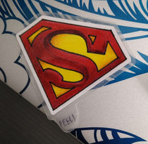 One sticker of the Superman logo.
