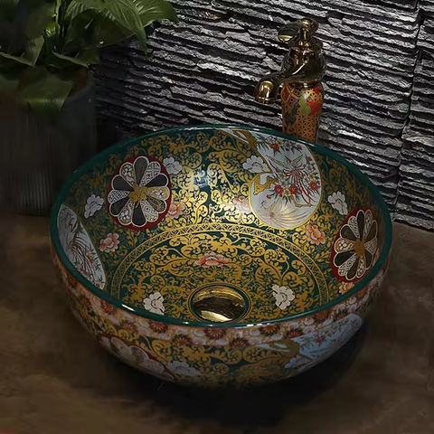 Grünes Keramik-Waschbecken mit goldenen und floralen Mustern