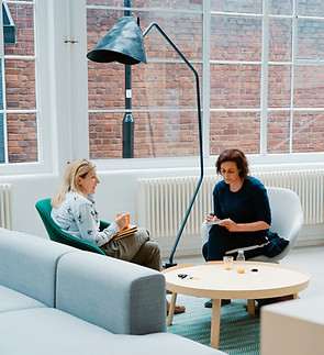 Employees engaging in a 360 degree feedback session