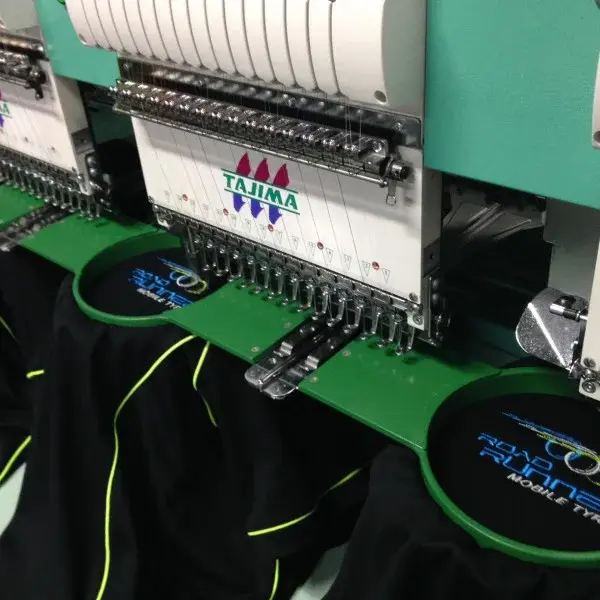 Close-up view of beautifully embroidered logos on a shirt