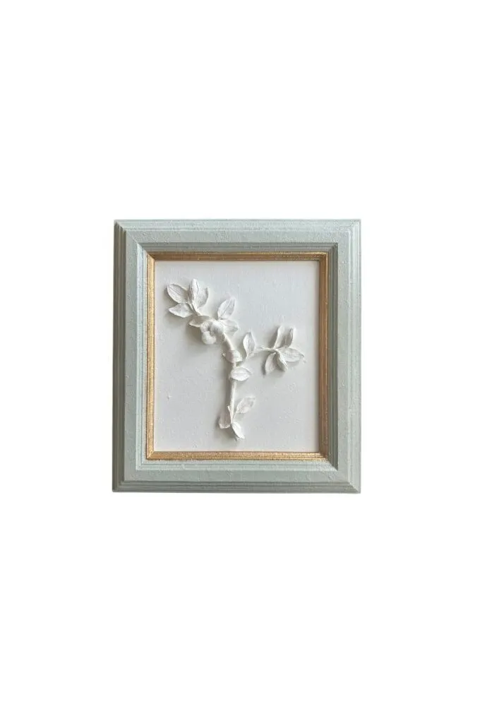 Framed plaster floral artwork with sculptural botanical detailing and layered texture