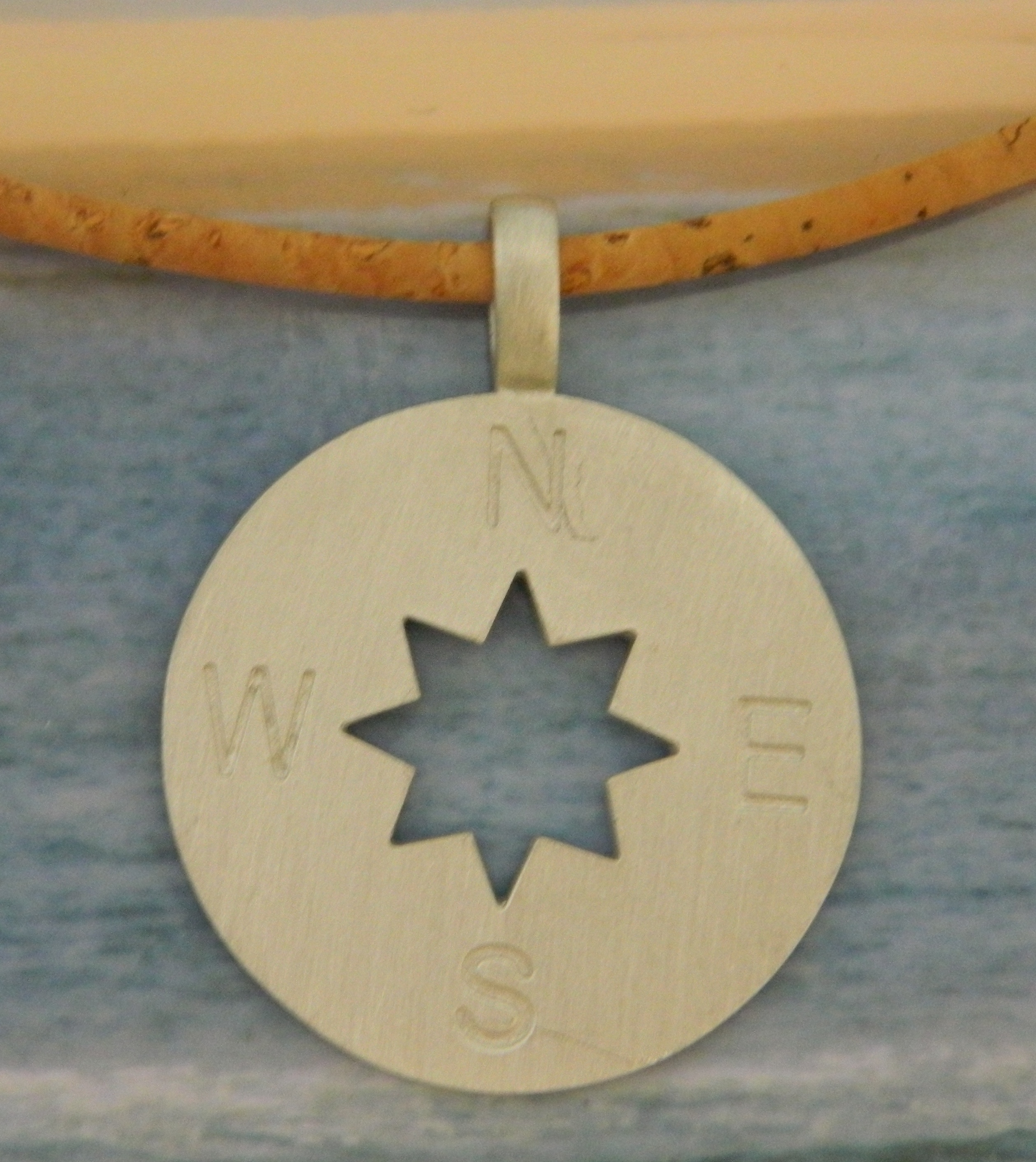 Pewter Compass Rose Necklace on Cork