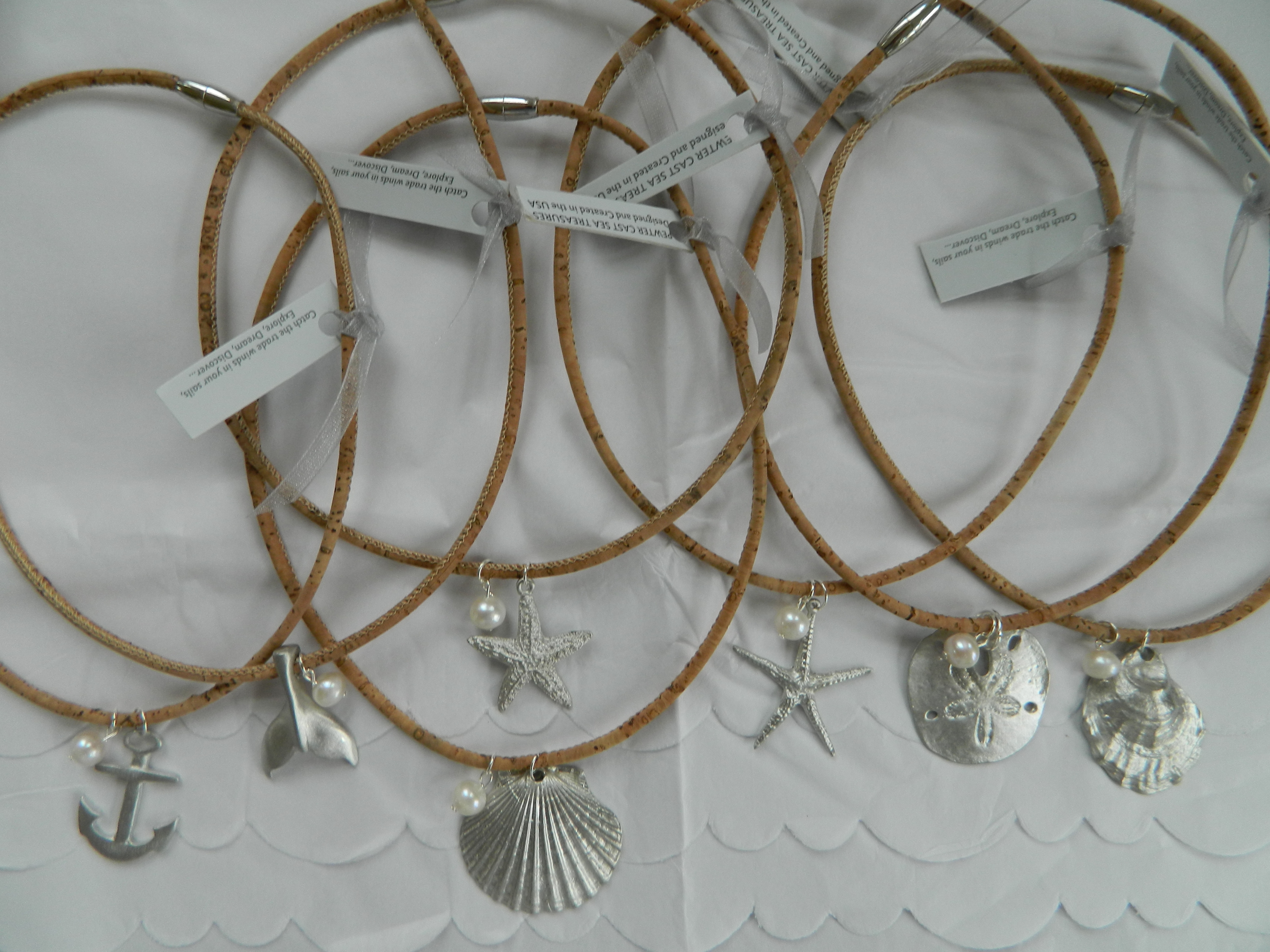 Pewter pendants with pearl on cork