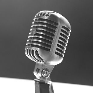 A microphone in black and white