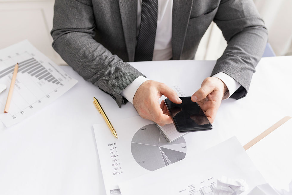 man-checking-his-phone-work.jpg