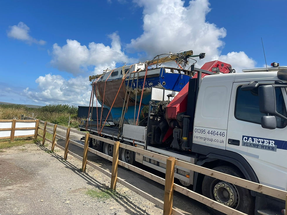 Carter Plant Hire lifting and transporting a salvaged boat