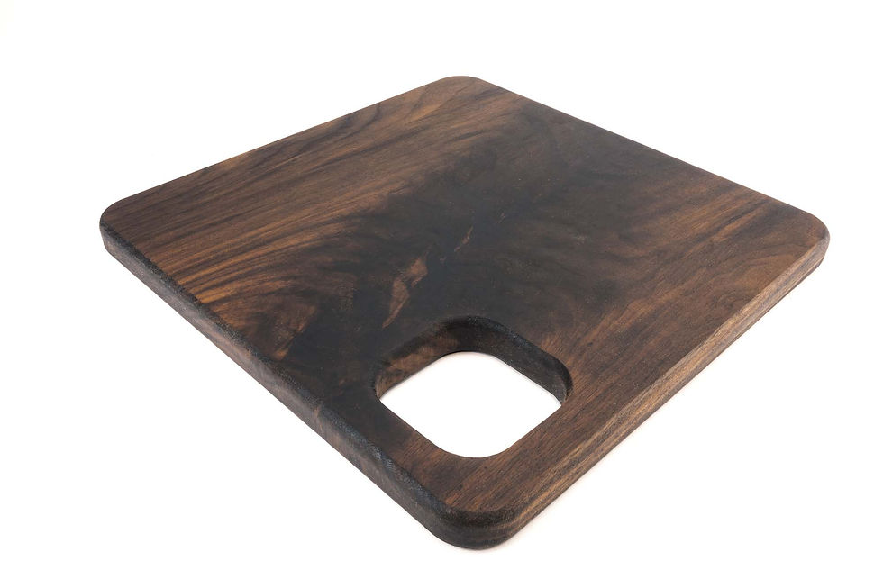 Thumbnail: Solid walnut cutting board with an elegant square shape, suitable for kitchen and dining use.