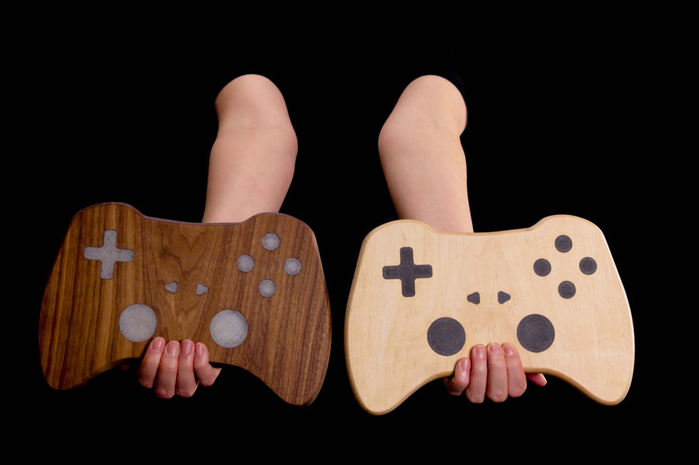 Light epoxy on dark walnut with dark epoxy on light maple contrasting game controller designs