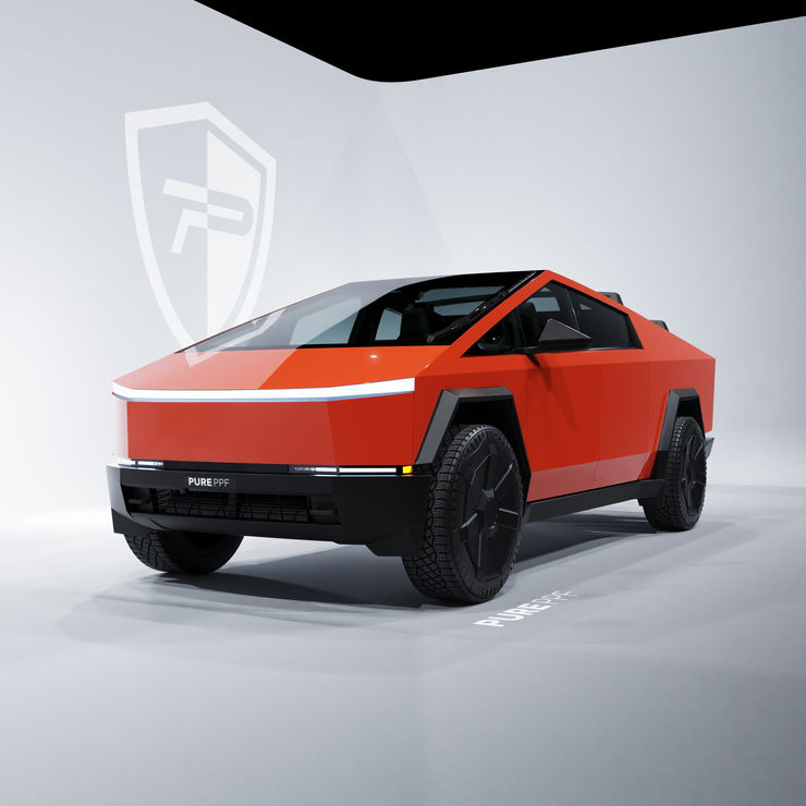 Front view of a Tesla Cybertruck wrapped in PurePPF Gloss Scarlet, displaying a rich and intense shade of red with hints of orange.